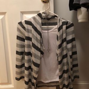 tank top attached to sparkly sweater with necklace